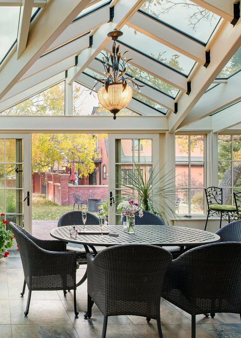 Drinks and cocktails wait in the conservatory for visitors to Cody Wyoming's high-end luxury historic Chamberlin Inn.