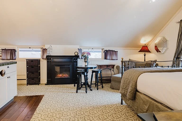 Chamberlin Inn Garden loft overview with Fireplace provides a welcome retreat in the heart of downtown Cody, Wyoming.