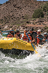 People rafting through rapids