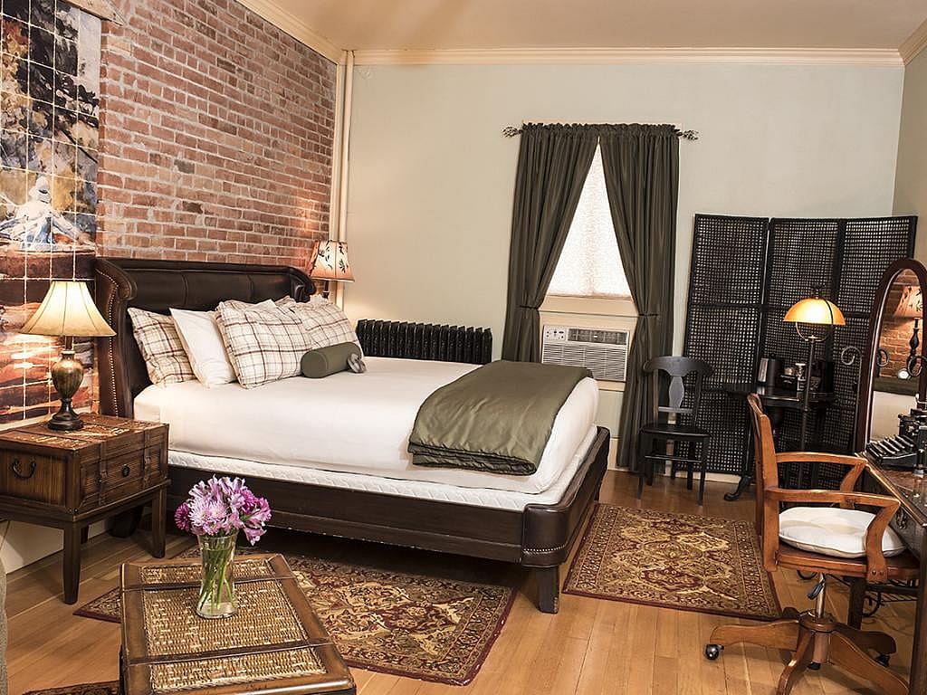 The historic Hemingway Room at the boutique hotel, the Chamberlin Inn, is furnished to reflect Earnest Hemingway's style.