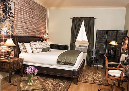 The historic Hemingway Room at the boutique hotel, the Chamberlin Inn, is furnished to reflect Earnest Hemingway's style.